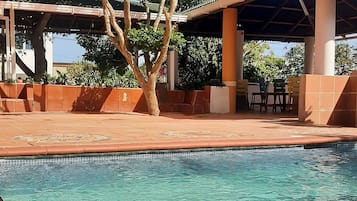 Outdoor pool, free cabanas, pool umbrellas