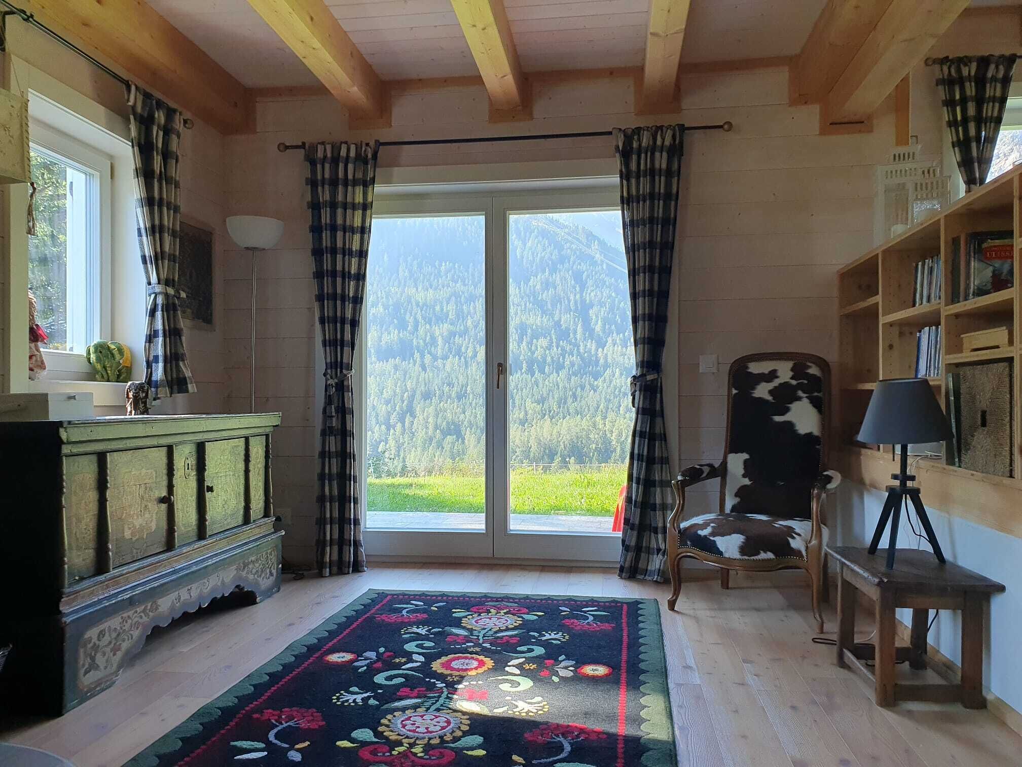 Exclusive Chalet | Living area | 32-inch flat-screen TV with satellite channels