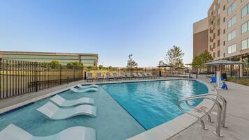 Outdoor pool, open 8:00 AM to 10:00 PM, sun loungers