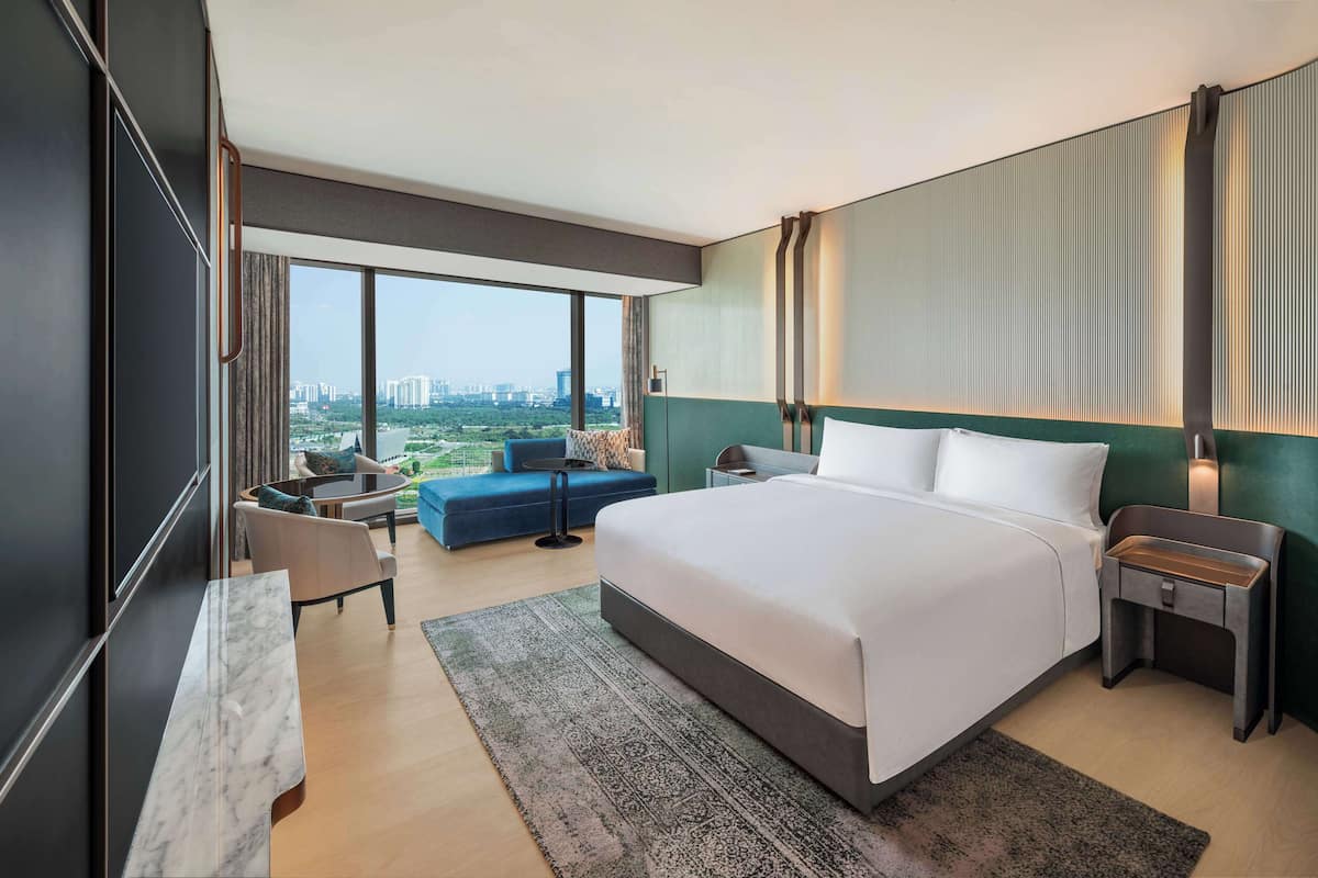 Suite, 1 King Bed, River View | Living area | 55-inch flat-screen TV with cable channels