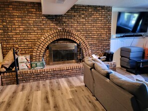 Smart TV, fireplace, DVD player, books
