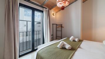Apartament Deluxe | 2 dormitoris, roba de llit d'alta qualitat i cobrellits