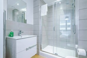 Shower, hair dryer, shampoo