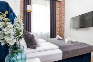 2 dormitorios, tabla de planchar con plancha, wifi y ropa de cama