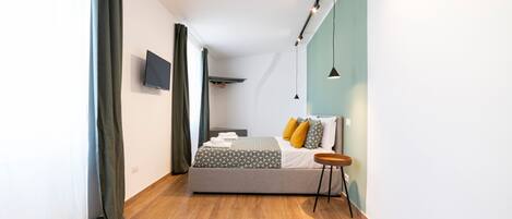 2 slaapkamers, een strijkplank/strijkijzer, gratis wifi, beddengoed