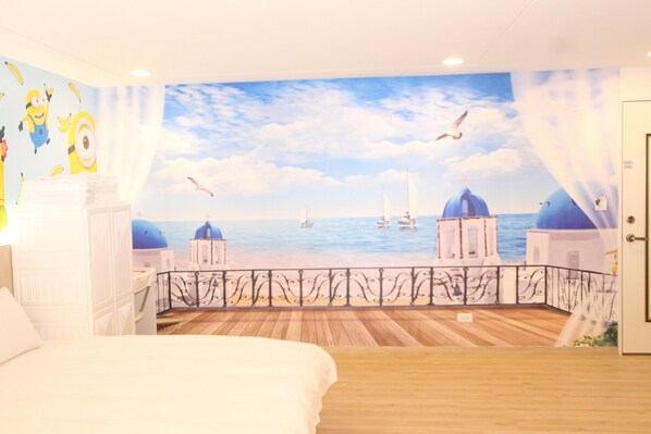 Family Room | Down comforters, individually decorated, free WiFi