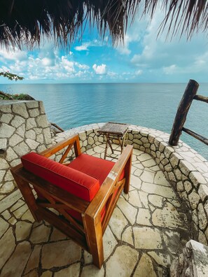 Terrace/patio - Negril Bungalow Paradise overlooking cliffs with Private Snorkeling Entrance. (Hanover Parish)
