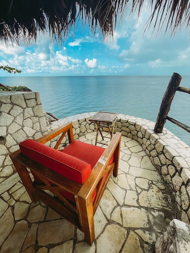 Negril Bungalow Paradise overlooking cliffs with Private Snorkeling Entrance.