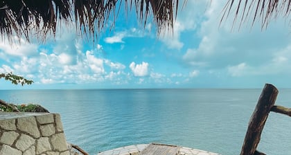 Negril Bungalow Paradise overlooking cliffs with Private Snorkeling Entrance.