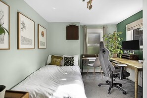 2 bedrooms, desk, laptop workspace, iron/ironing board