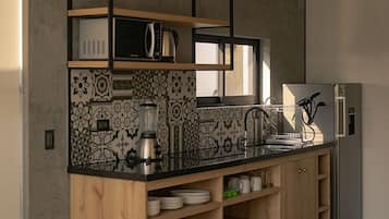Full-sized fridge, microwave, electric kettle, rice cooker