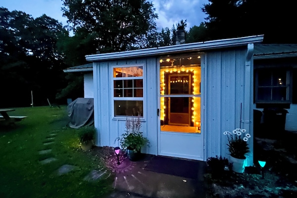 Main entrance and mud room. Motion light will turn on when you get close.