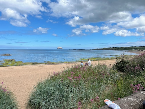 Stunning location - beachfront ground floor flat with private parking. Fab views