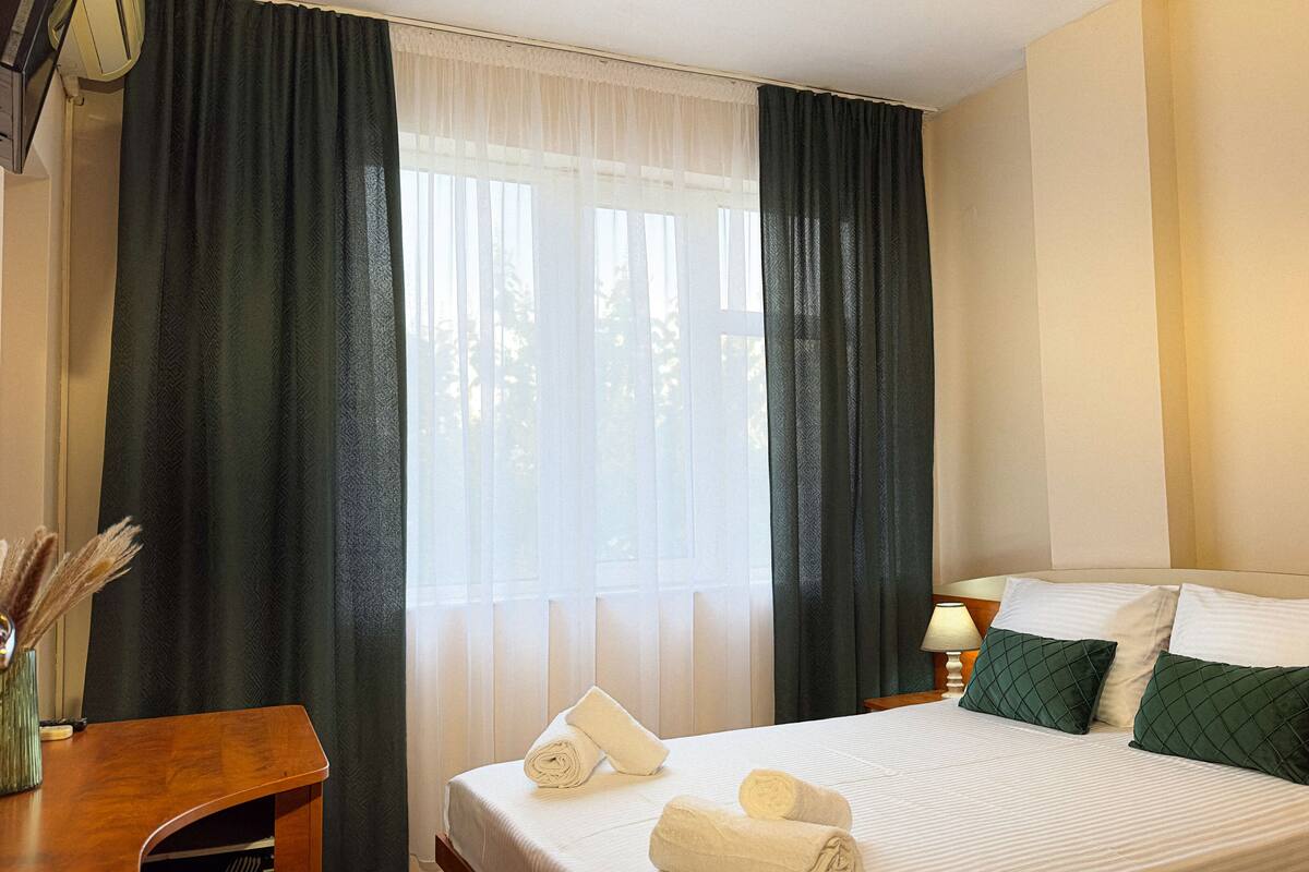 Standard Double Room | Desk, blackout drapes, iron/ironing board (on request), WiFi (free)