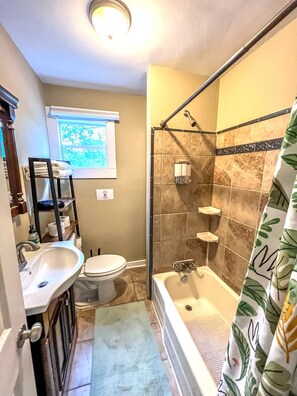 Hair dryer, towels, soap, shampoo