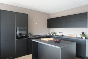Condo superior | Tabla de planchar con plancha y wifi gratis 