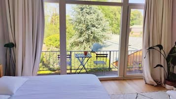 1 bedroom, desk, iron/ironing board, travel crib