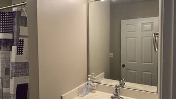 Hair dryer, towels, soap, shampoo
