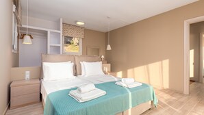 A neatly arranged bedroom with a bed, bedside tables, and a window with a view. - Modern Seafront Villa, A/C, Private Pool, Amazing Sea Views & Beautiful Sunrises - 30m from the Sea! (Boukari)
