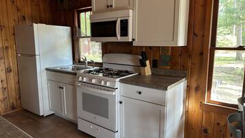 Fridge, microwave, toaster, cookware/dishes/utensils