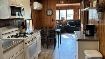 Fridge, microwave, toaster, cookware/dishes/utensils