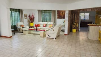 Habitación doble superior | Área de sala de estar