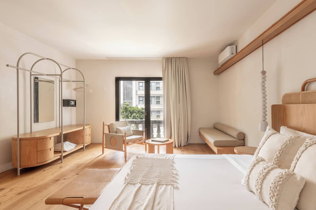 Deluxe Suite | Luxe beddengoed, een minibar, gratis wifi, beddengoed