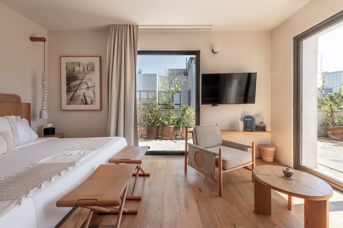 Master Suite | Luxe beddengoed, een minibar, gratis wifi, beddengoed