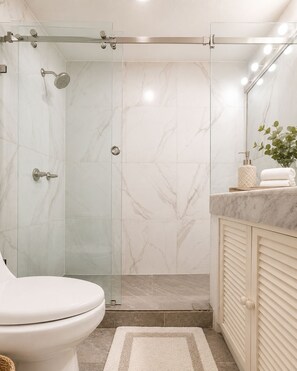 Shower, hair dryer, towels, soap