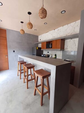 Fridge, microwave, coffee/tea maker, toaster