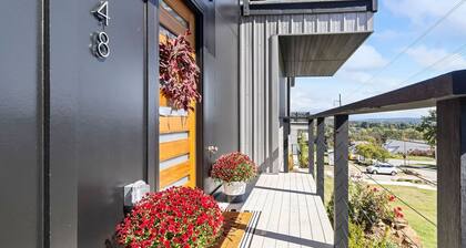 Stunning views from the treetop terrace of this brand new,
contemporary home.