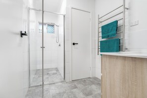 Eco-friendly toiletries, hair dryer, towels, soap