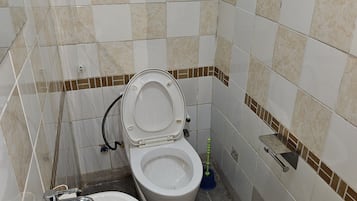 Bidet, towels, soap, shampoo