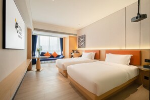 A hotel room with two beds, a desk, a chair, a sofa, and a large window with curtains. - Guangzhou Baiyun Airport Rezen Select Hotel (Guangzhou)