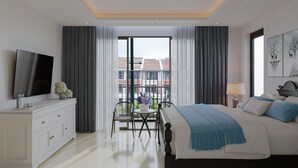 Un dormitorio moderno con cama, televisor y vistas a edificios a través de amplios ventanales.