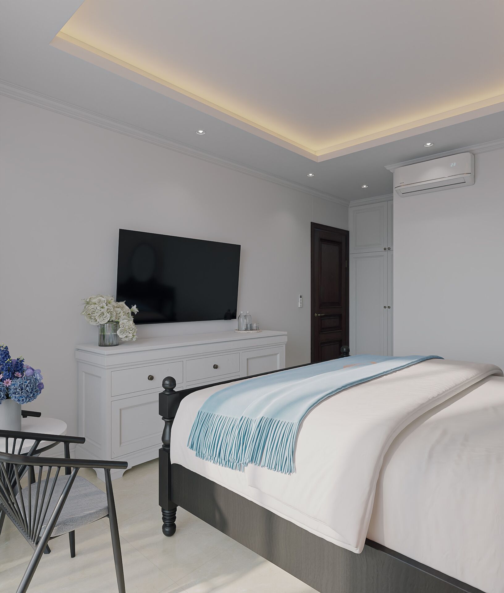 Une chambre à coucher moderne, comprenant un lit, une télévision, une commode et un bureau avec une chaise.