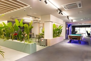 32-inch Smart TV with digital channels, video game console, Netflix