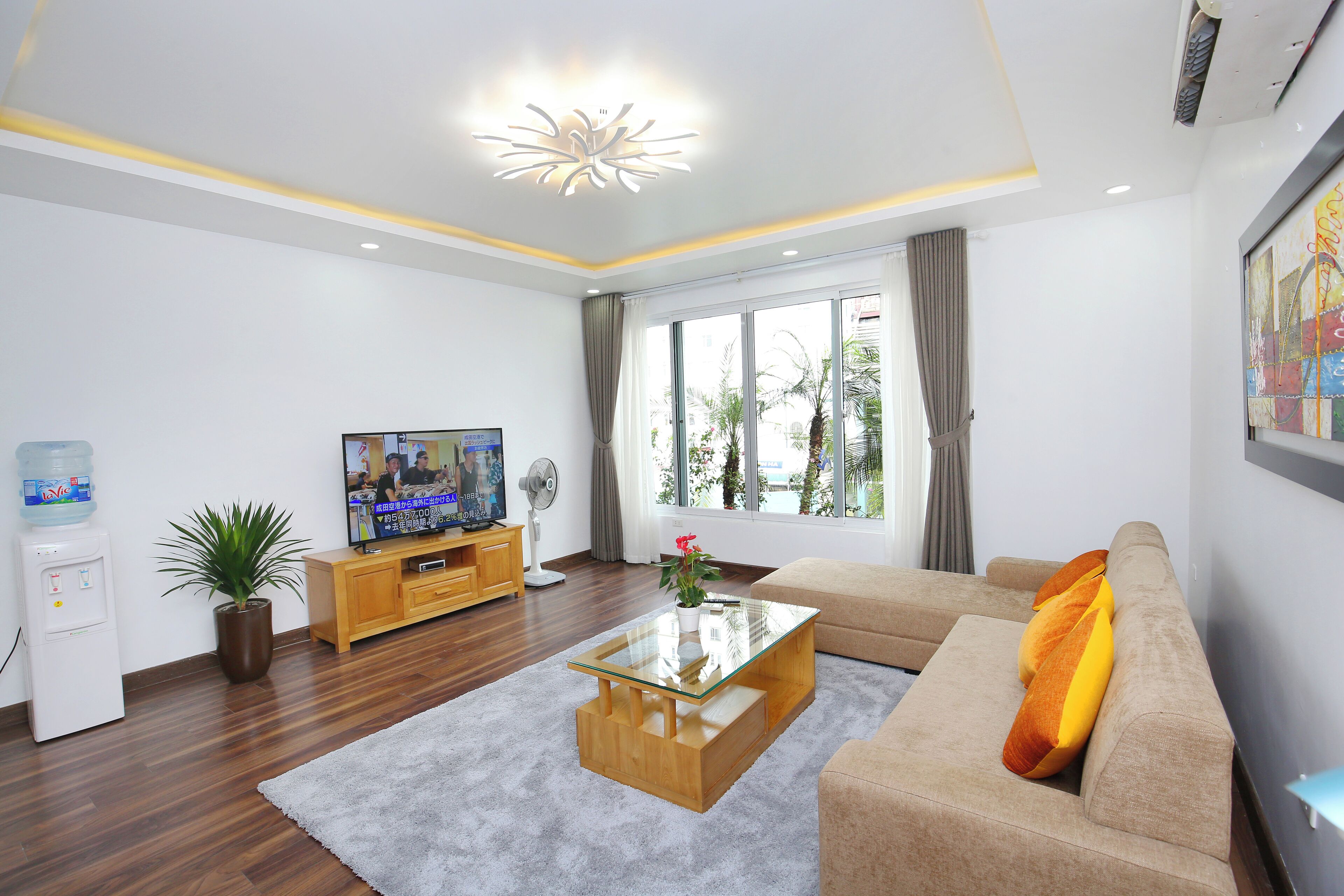 Executive Apartment, 1 Bedroom | Living area | 56-inch LCD TV with cable channels, fireplace