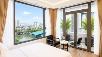Premium bedding, pillow-top beds, desk, laptop workspace