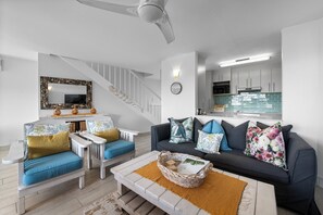 Superior Villa | Living area | 50-inch flat-screen TV with satellite channels - San Lameer Villa 2825 (Southbroom)