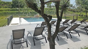 Seasonal outdoor pool, pool umbrellas, sun loungers