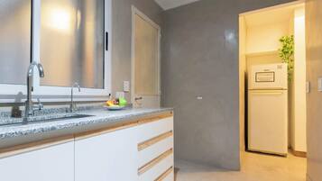 Microwave, coffee/tea maker, toaster, cookware/dishes/utensils