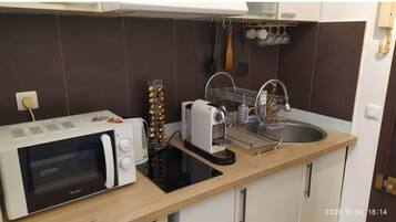 Microwave, stovetop, coffee/tea maker, toaster