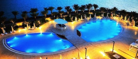 Indoor pool, 2 outdoor pools, open 8:30 AM to 11:30 PM, pool umbrellas