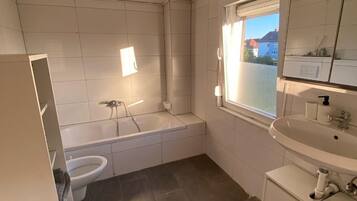 Hair dryer, towels, soap, shampoo