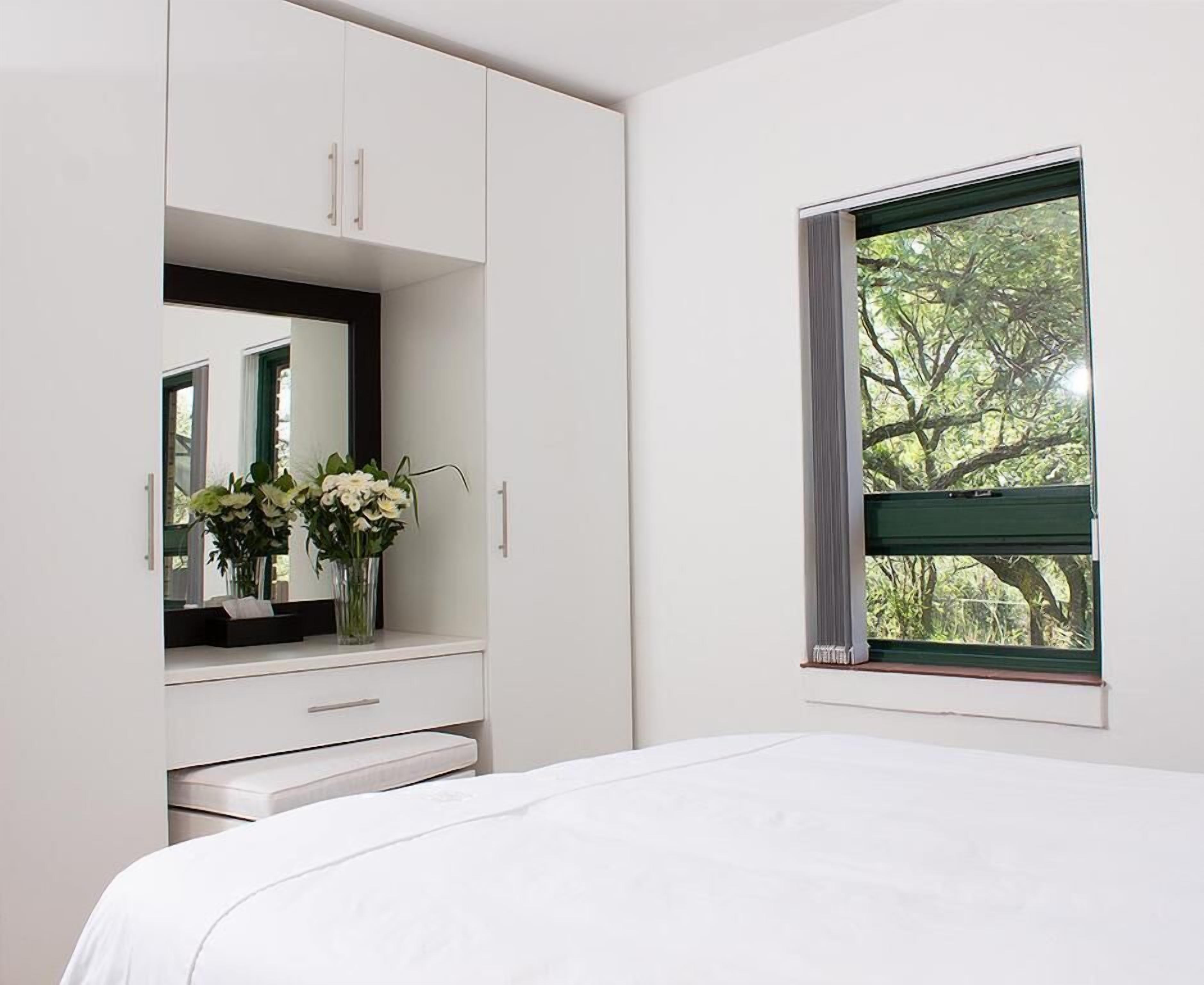 Premium bedding, down comforters, pillowtop beds, in-room safe