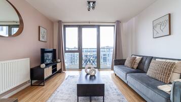 Apartment | Living area | 37-inch TV with cable channels, Netflix, streaming services