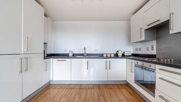 Apartment | Private kitchen | Fridge, microwave, oven, stovetop