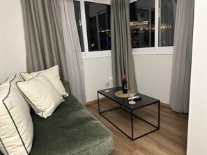 Acropolis Divine Penthouse with hot tub | Living area | 35-inch TV with satellite channels - Acropolis Divine Apartments (Athens)