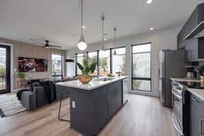 Fridge, microwave, oven, stovetop - Cowboy Condo-Odyssey-Pool & Gym-Heart of Midtown (Nashville)